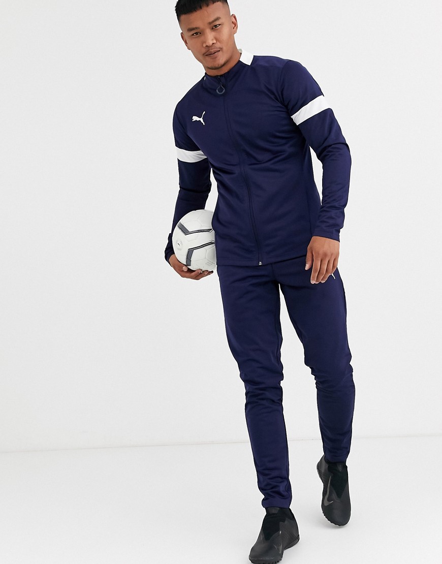 Puma Football tracksuit in navy with white panels exclusive to ASOS