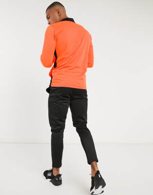 black and orange puma tracksuit