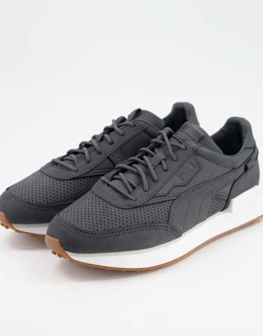 Puma Future Rider premium sneakers in black with gum sole | ASOS