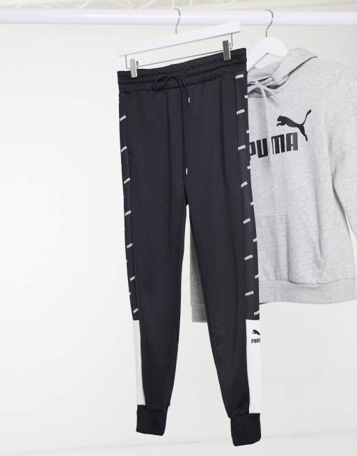 Puma track pants store with zipper pockets