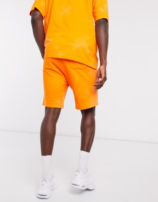 orange puma shorts