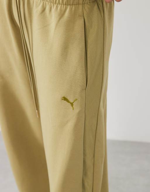 Puma Her relaxed barrel leg pants in khaki green, 4 of 5