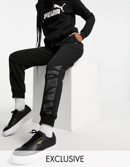 Puma high waisted jogging bottoms in black ASOS