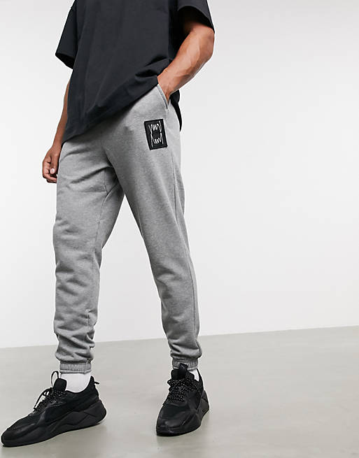 Puma Hoops slim logo sweatpants in gray | ASOS