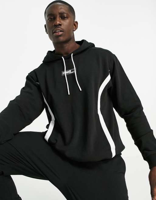 Puma Hoops small logo hoodie in black | ASOS