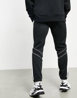 puma track pants black