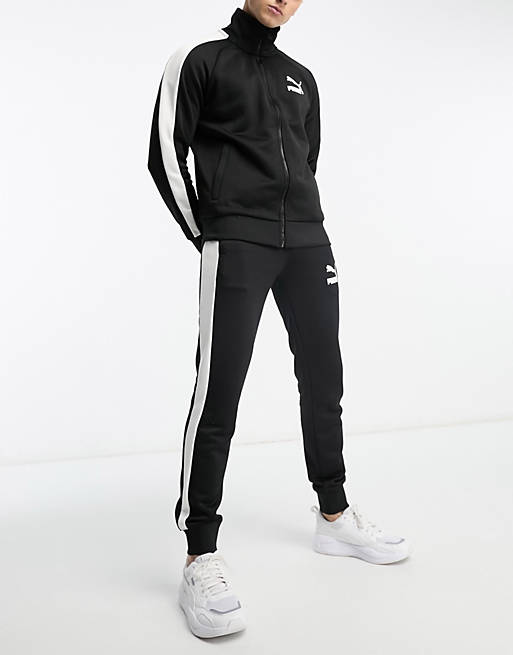 Puma Iconic T7 Track joggers in black | ASOS
