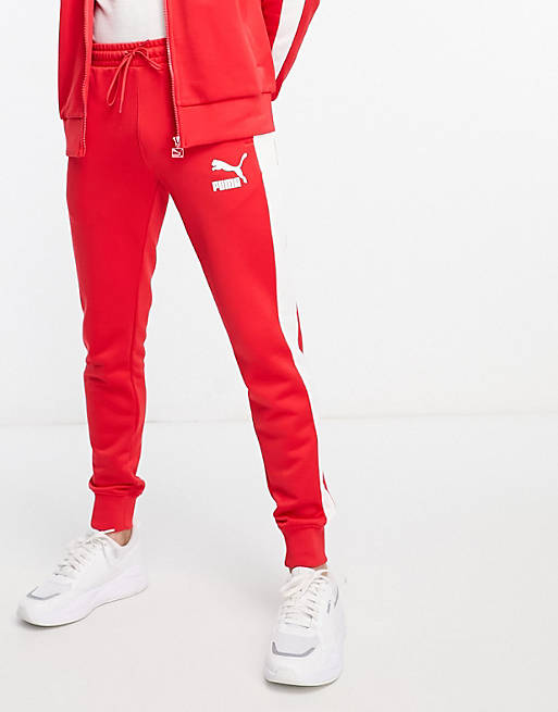 Puma Iconic T7 Track joggers in red | ASOS