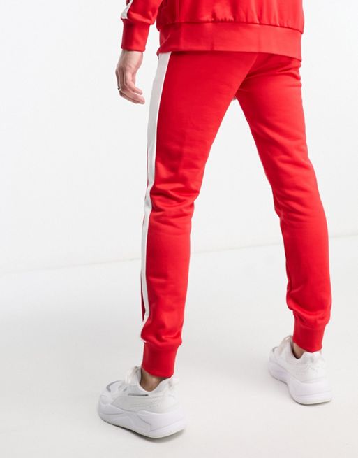 Puma Iconic T7 Track joggers in red