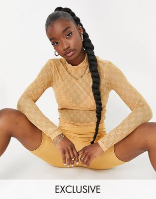 Puma Infuse AOP long sleeve fitted top in brown - exclusive to ASOS