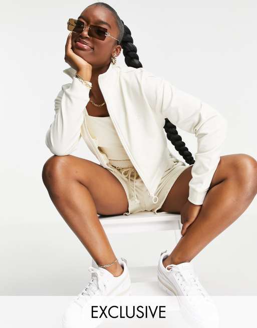 PUMA – Infuse – Sweatjacke in Creme