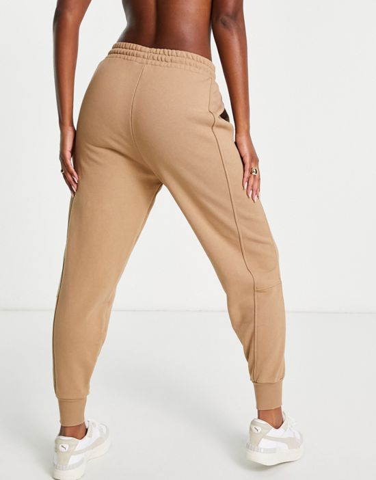https://images.asos-media.com/products/puma-infuse-sweatpants-in-tan/201850193-4?$n_550w$&wid=550&fit=constrain