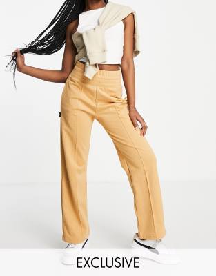 Puma Infuse wide leg trousers in caramel - ASOS Price Checker