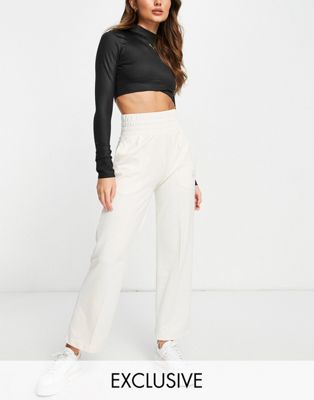 Puma Infuse wide leg trousers in off white