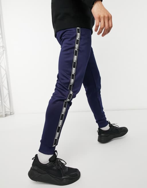 Puma – Jogginghose mit Zierstreifen aus Polytricot in Marineblau, 2 von 4