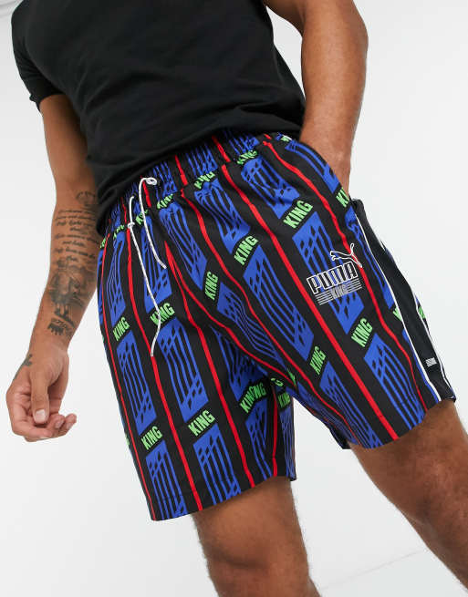 Puma King all over print logo shorts in blue