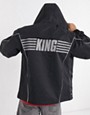 Puma King oversized logo jacket in black
