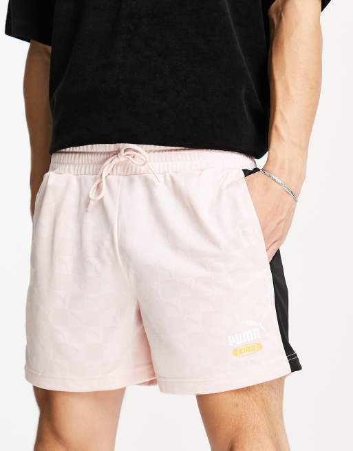 Puma King soccer shorts in pastel pink