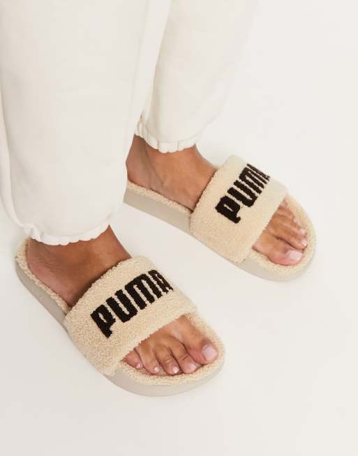 Puma Leadcat sherpa sliders in oatmeal and chocolate