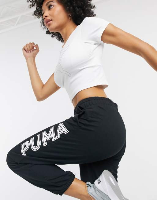 Puma logo on sale joggers in black