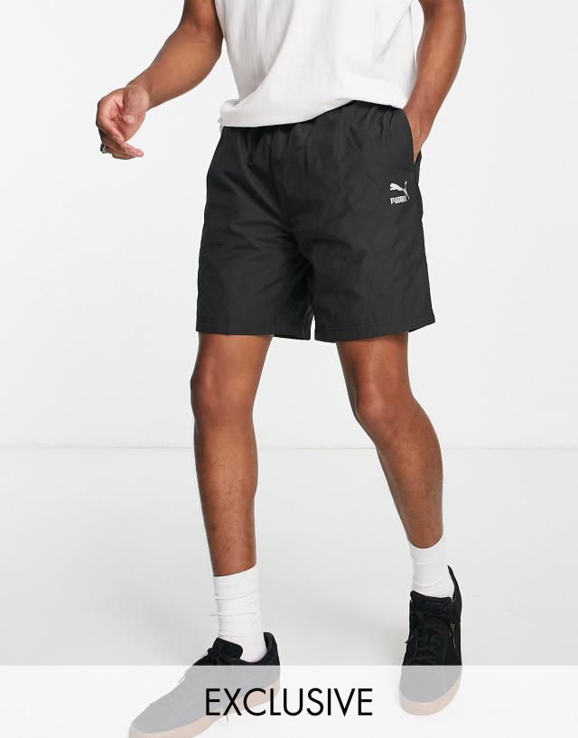 Puma - logo quilted shorts in black exclusive to asos