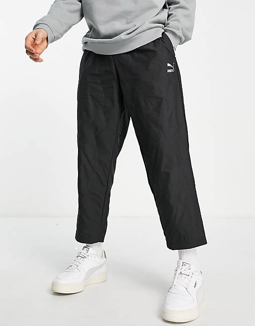 Puma logo quilted tapered pants in black
