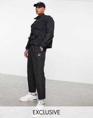 Puma logo quilted trousers in black exclusive to ASOS