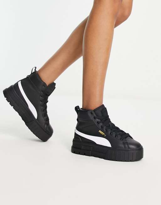 Puma Mayze Mid chunky trainers in black and gold