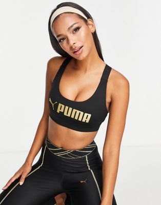 Puma mid-impact fit sports bra in black - ASOS Price Checker