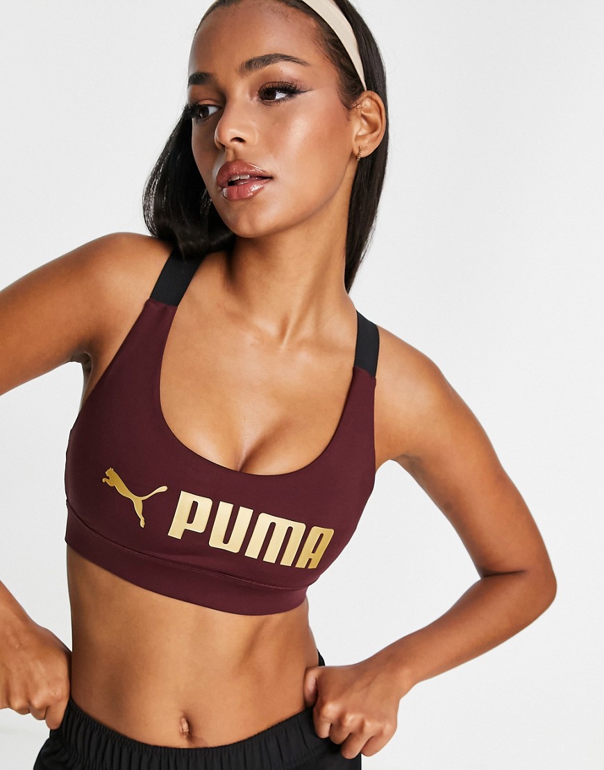 Puma mid-impact fit sports bra in purple