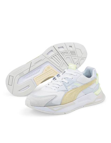 PUMA Mirage sport sneakers in white and gray