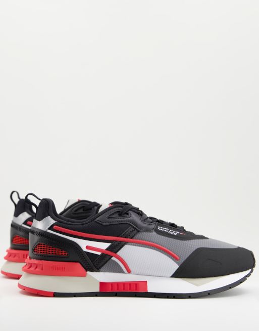 Black and red store puma trainers