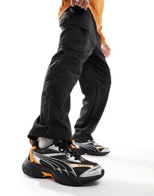 Puma Morphic trainers in black and orange - ASOS Price Checker