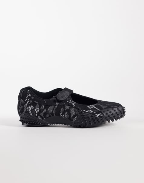 PUMA – Mostro Fey – Svarta sneakers i spets - view 1
