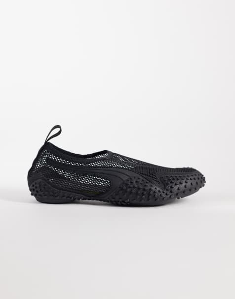 PUMA – Mostro Flex – Czarne siateczkowe buty sportowe - view 1