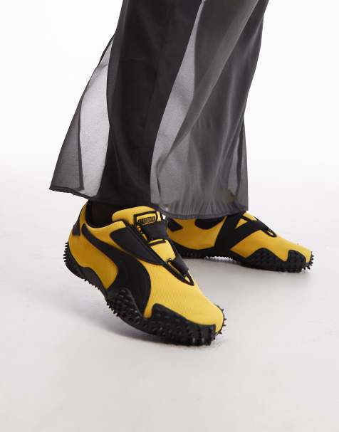 PUMA – Mostro OG Prime – Żółto-czarne buty sportowe unisex - view 1