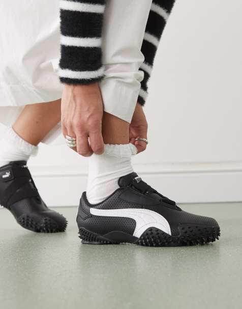 Puma Mostro trainers in black - view 1