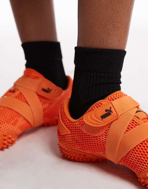 Puma Mostro Venom Lure sneakers in orange | ASOS
