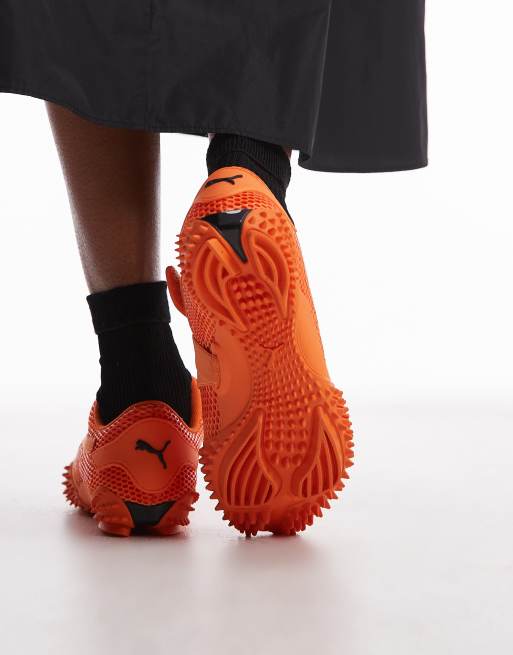 Puma Mostro Venom Lure sneakers in orange | ASOS