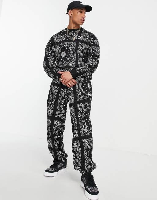 Puma off beat paisley joggers in black exclusive to asos