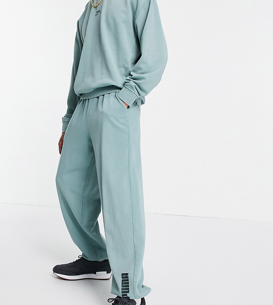 Puma oversized joggers in washed green exclusive to ASOS