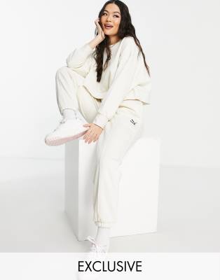 ASOS DESIGN oversized parachute sweatpants in off white