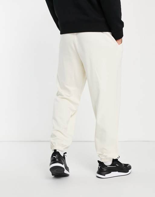 Puma oversized pleated sweatpants in off white - exclusive to ASOS