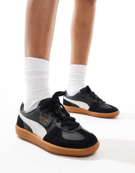 PUMA Palermo Leather sneakers in black and white