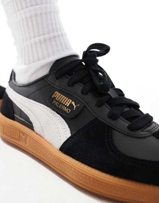 PUMA Palermo Leather sneakers in black and white