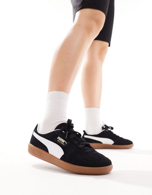 PUMA Palermo sneakers in black and white