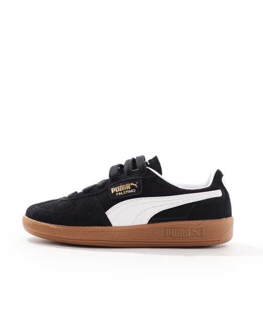 Puma suede black with brown sole best sale