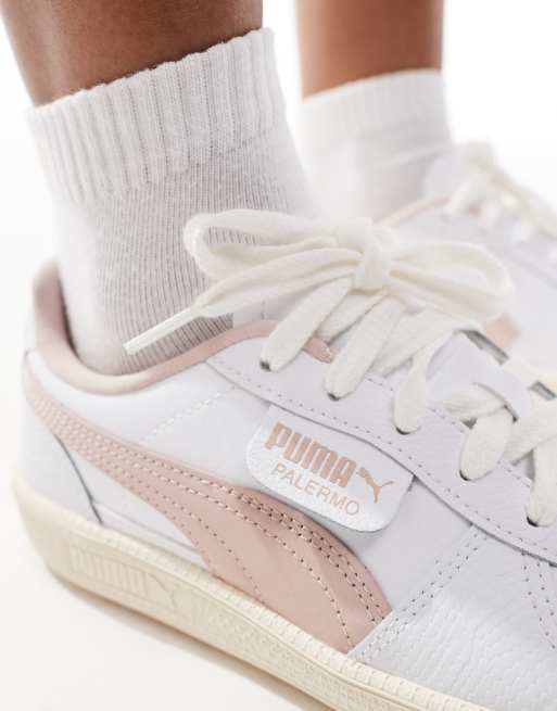 Puma Palermo sneakers in white with pink detail