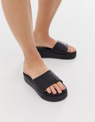 Puma Platform black sliders | ASOS