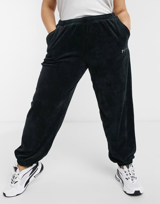 Puma plus cord balloon crop sweatpants in black- exclusive to ASOS